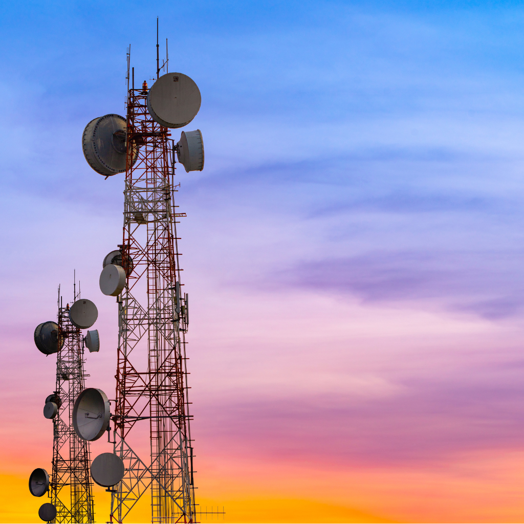 Telecom towers with sunset backdrop