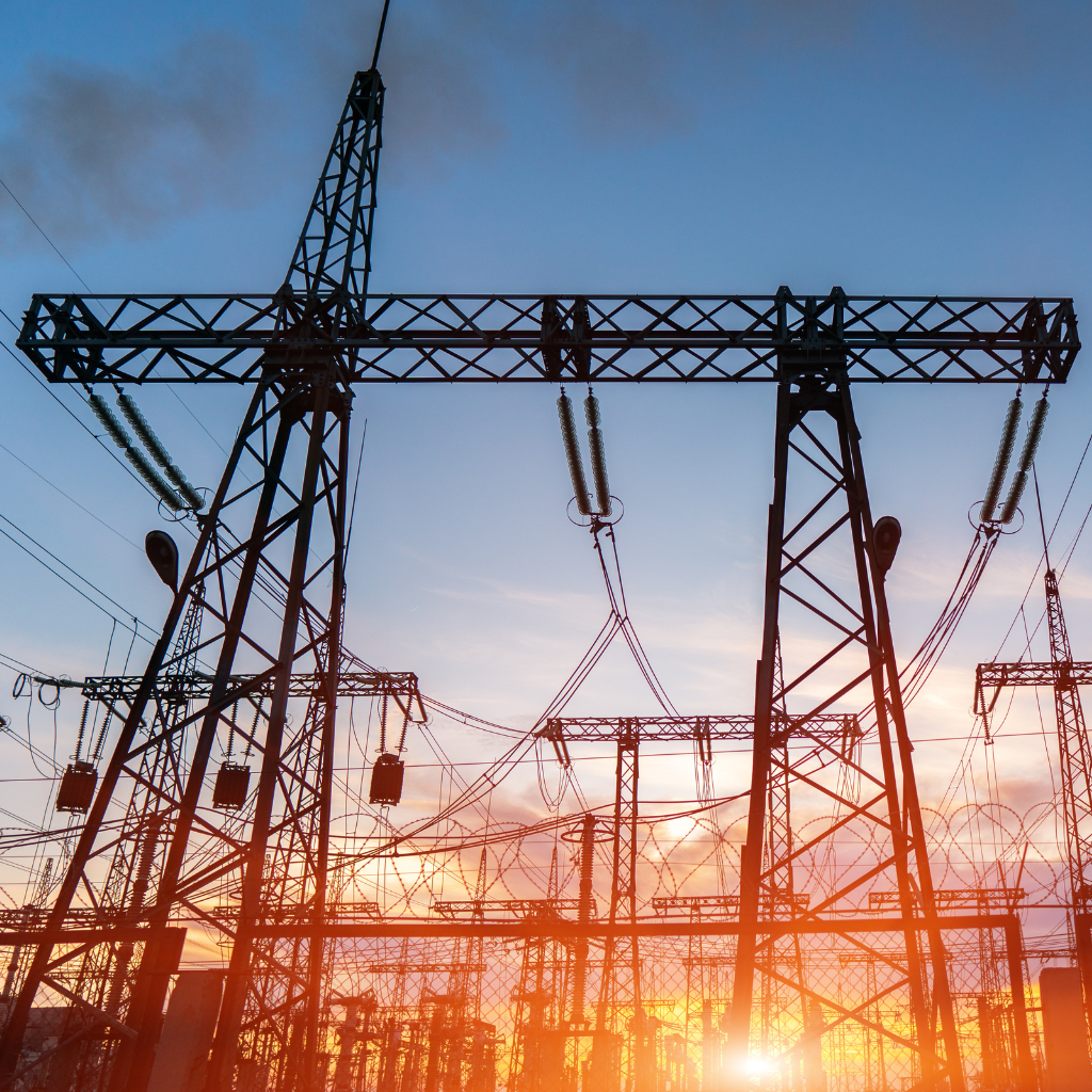 Power lines with sunset backdrop